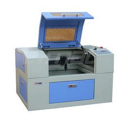 Laser engraving and cutting machine